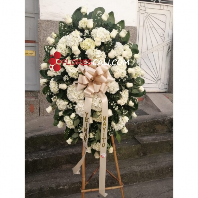 Arreglo fúnebre hortensias y rosas en cali