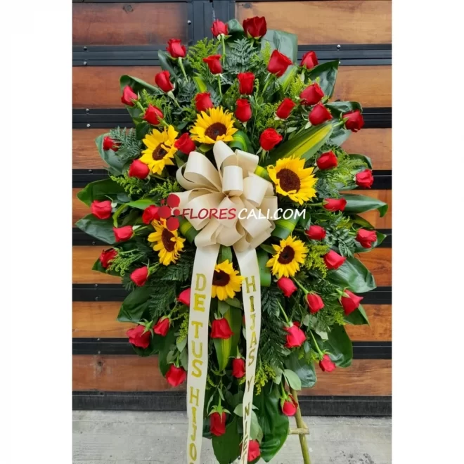 Corona funebre rosas y girasoles en cali