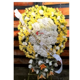 Corona funebre amarilla con hortensias cali